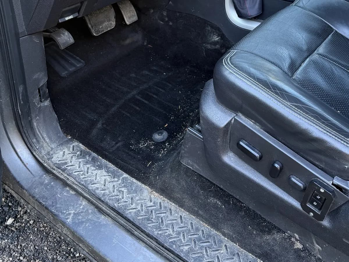 Truck driver's floor, before